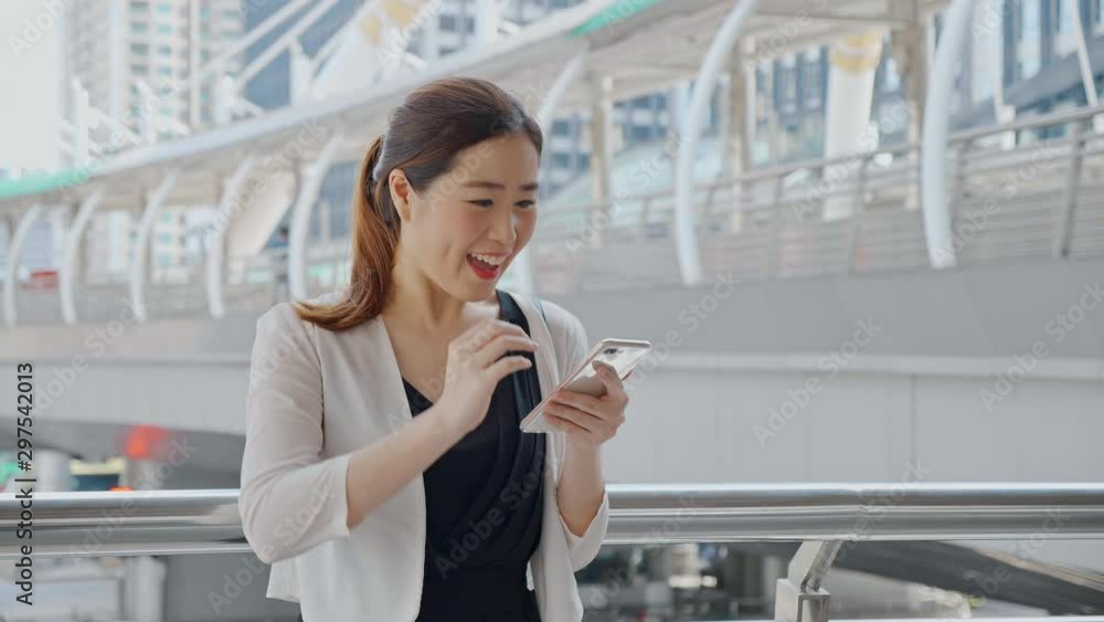 Shot of the Beautiful Business woman looking on phone Successful Job in city. 4K Slow Motion corporate shot Shot of the Beautiful Business woman looking on phone Successful Job in city. 4K Slow Motion corporate shot