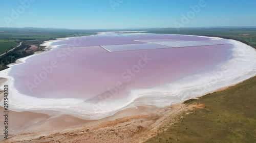 Aerial 4K drone footage of Lake Bumbunga, a naturally occuring pink salt lake  beside the small town  of Lochiel in South Australia  photo