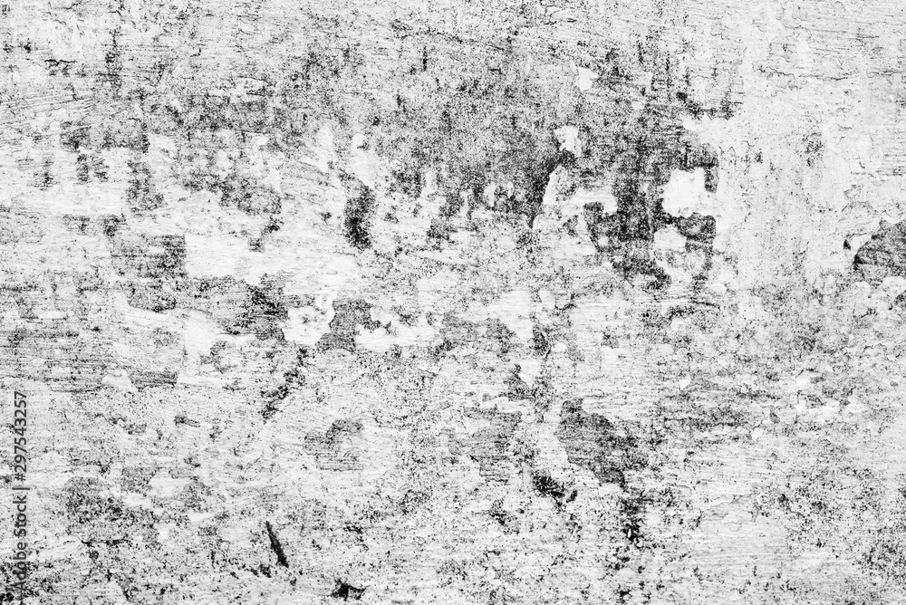 Texture of a concrete wall with cracks and scratches which can be used as a background Texture of a concrete wall with cracks and scratches which can be used as a background
