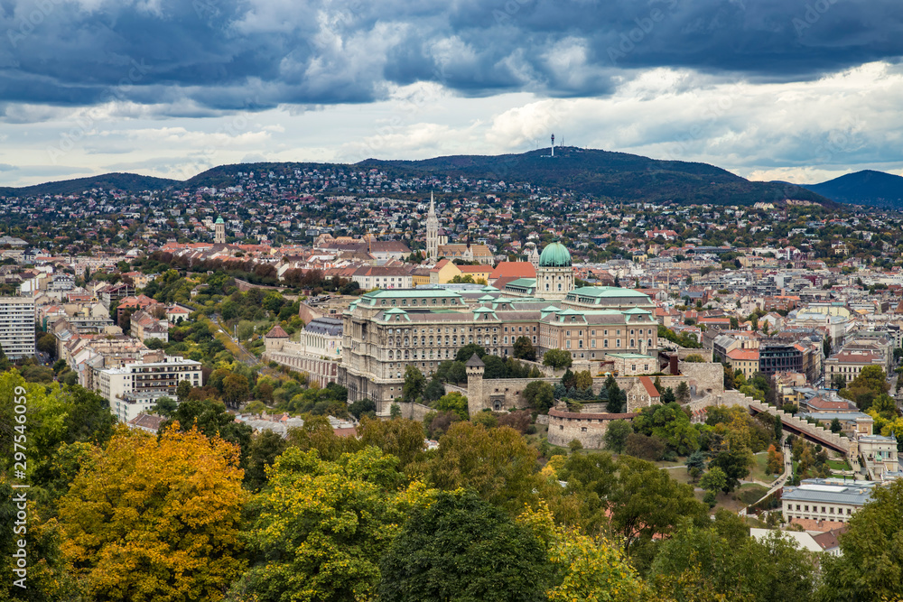 Autumn aerial view from Gellert Hill to Buda Castle and King Palace Budavári Palota of the Hungarian kings on stormy weather