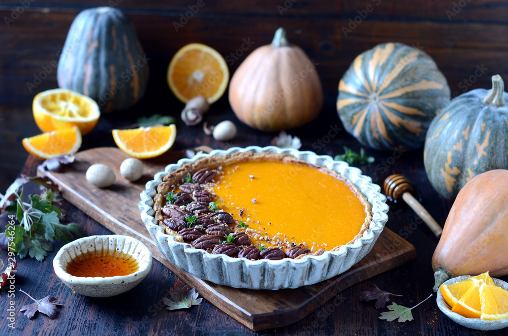 Pumpkin tart on a dark wooden background, still life Pumpkin tart on a dark wooden background, still life
