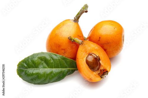 Group of ripe loquat fruits isolated on white background