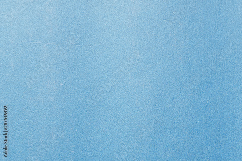 Blue color cardboard. Clean light blue paper texture. High resolution photo.