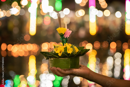 People holding Krathong, Loy Krathong is new year festival celebrated annually in Thailand.