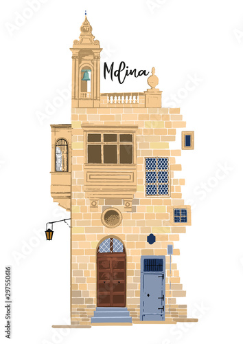 Part of traditional maltese house in Mdina made of sandy stone bricks with various doors, windows and balconies