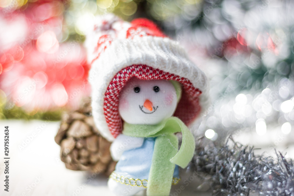 Christmas symbol - happy snowman in a red hat. Christmas symbol - happy snowman in a red hat.