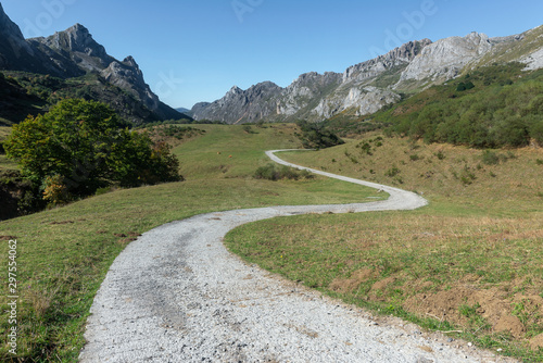 Gravel road to Lago del Valle lake in Somiedo Natural Park, Asturias, Spain photo