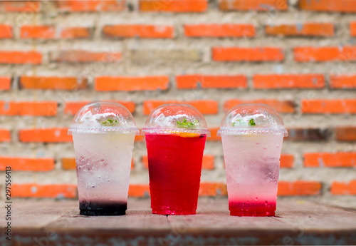 Colorful Italian soda in a plastic cup