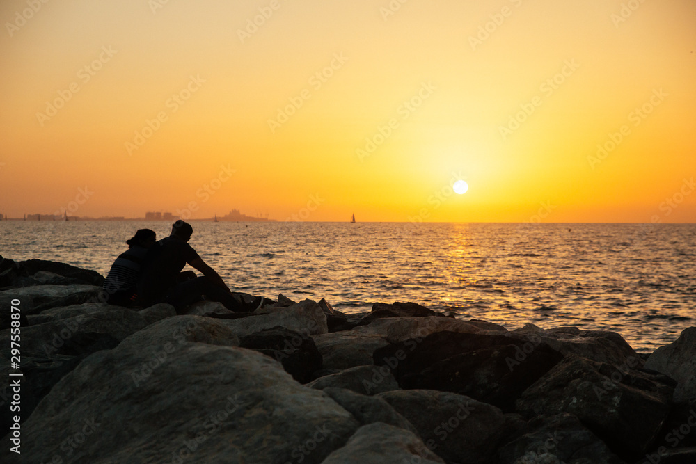 A couple in a sunset in Dubai, just silhouettes