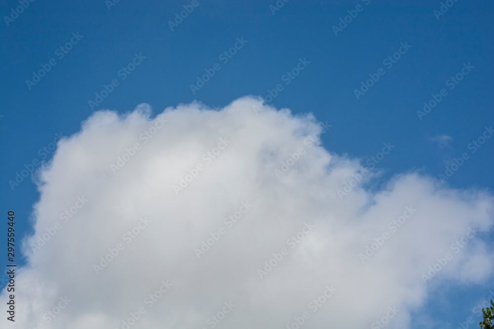 Obraz premium white clouds in blue sky texture