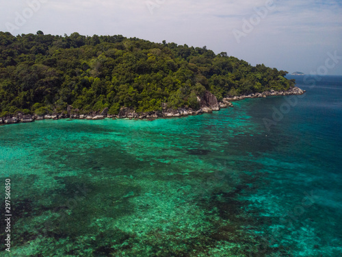 A diving trip in the crystal clear water in front of a lonely island in Southeast Asia