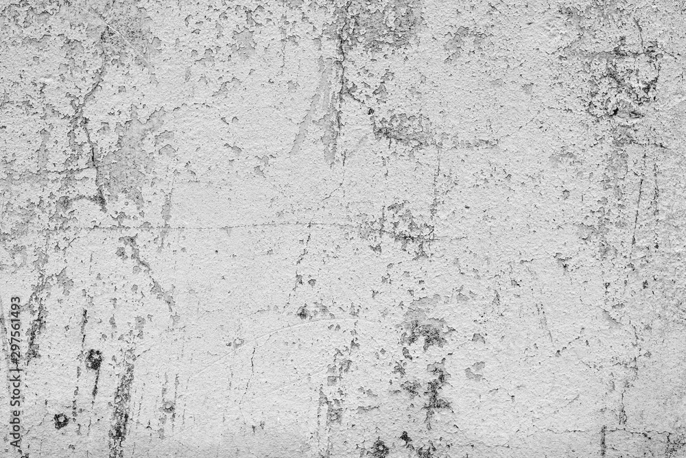 Texture of a concrete wall with cracks and scratches which can be used as a background Texture of a concrete wall with cracks and scratches which can be used as a background