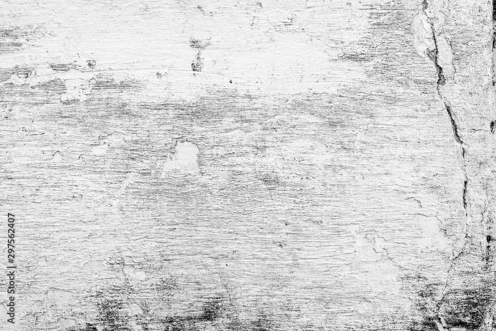 Fototapeta premium Texture of a concrete wall with cracks and scratches which can be used as a background