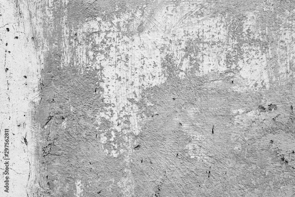 Texture of a concrete wall with cracks and scratches which can be used as a background Texture of a concrete wall with cracks and scratches which can be used as a background