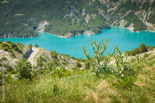 Majestic mountain lake Serre-Ponçon (Lac de Serre-Ponçon) is a lake in southeast France; it is one of the largest artificial lakes in western Europe. HD wallpaper, 4k green background photo