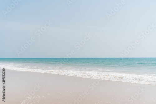 ocean landscape and footprints in the sand