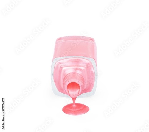 Bottle of pink nail polish with enamel drop samples, isolated