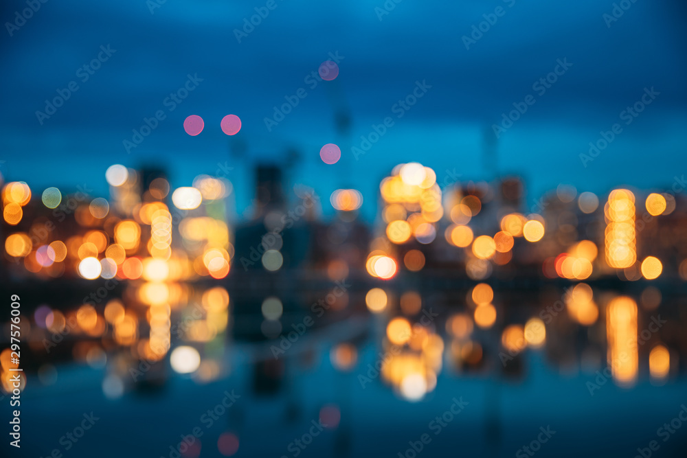 Oslo, Norway. Night Abstract Boke Bokeh Background Effect. Design Backdrop. Night View Embankment And Residential Multi-storey House In Gamle Oslo District. Residential Area Reflected In Sea Waters - obrazy, fototapety, plakaty 