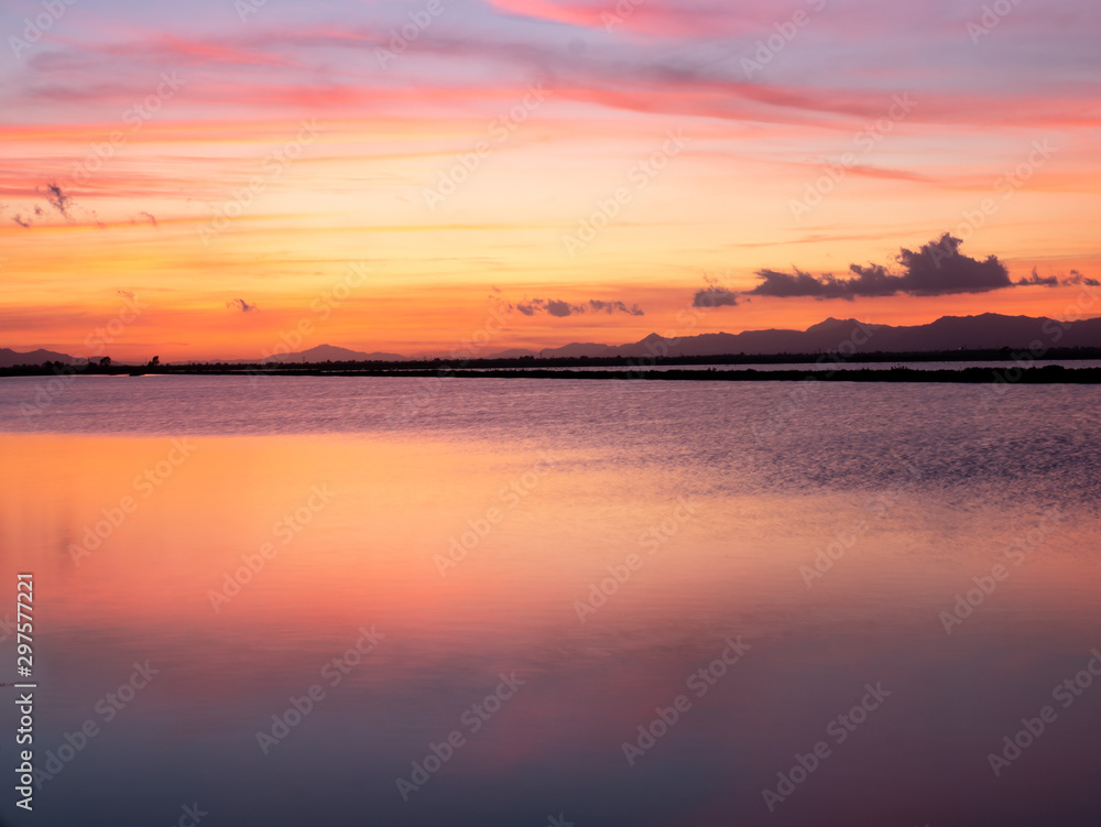 orange sunset on salty lake in Santa Pola