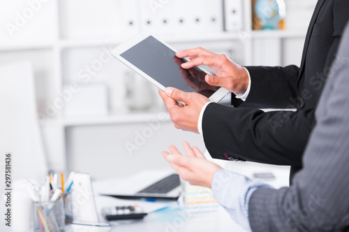 Businesspeople using devices
