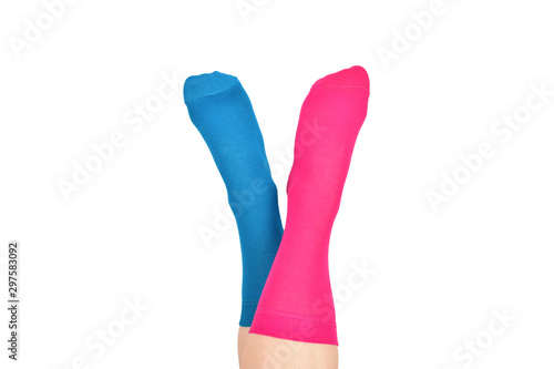 Woman in blue and purple socks isolated on white background. Top view.