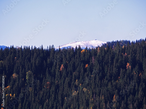 Carpatian village at mountains at the sunny day photo