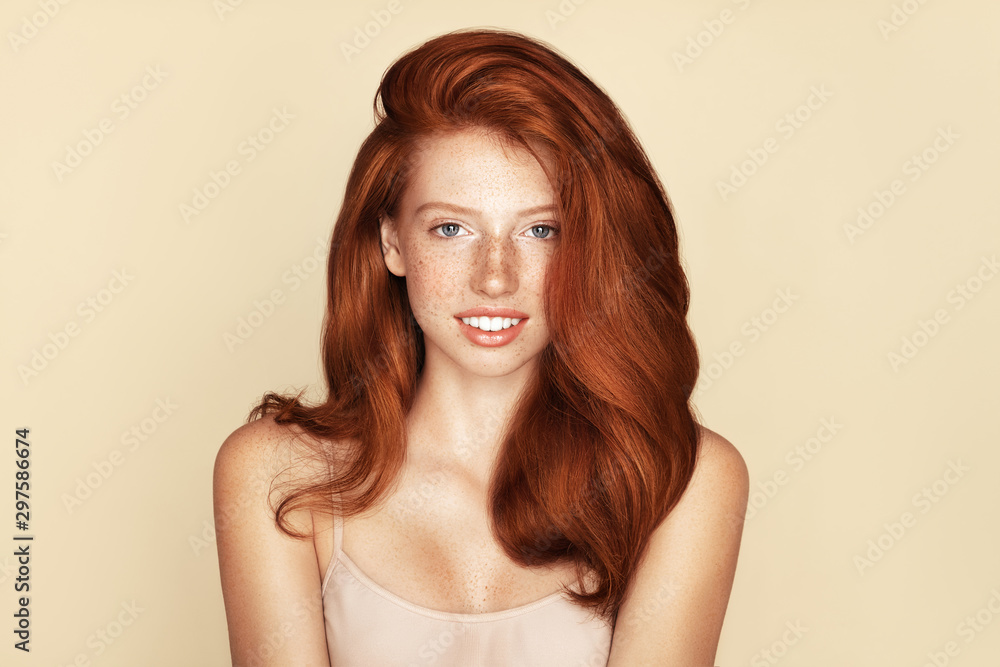 Beauty Freckles young girl laughter portrait. Attractive model with beautiful natural ginger red hair Beauty Freckles young girl laughter portrait. Attractive model with beautiful natural ginger red hair