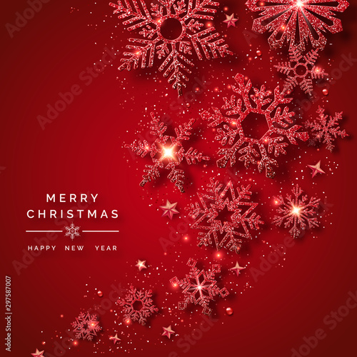 Christmas background with shining red snowflakes, balls, stars and confetti. Merry Christmas card illustration on red background. Sparkling red snowflakes with glitter texture