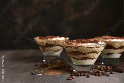 Tiramisu - traditional italian dessert from mascarpone cheese and biscuit. No baked chessecake. photo