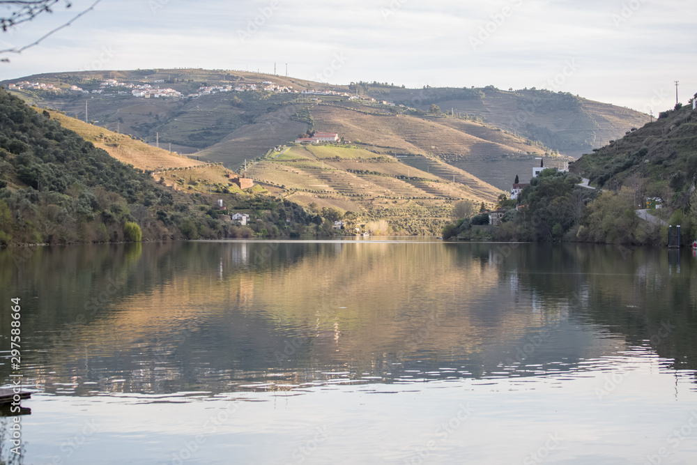 General view at the Douro river , on Pinhao city, hills with vineyards as background