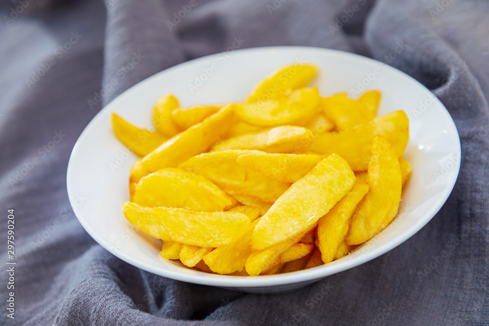 Golden French fries potatoes ready to be eaten Golden French fries potatoes ready to be eaten