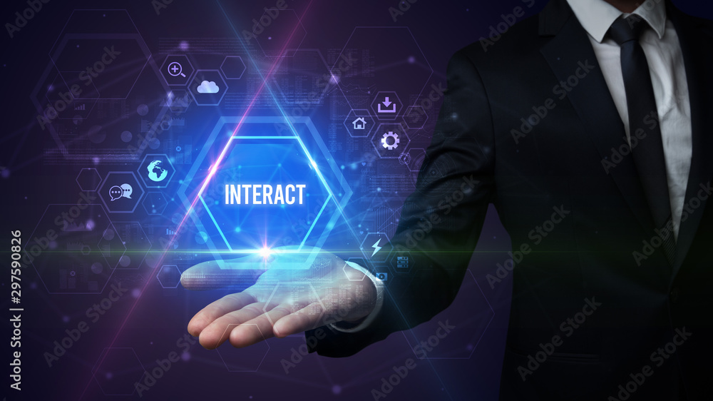 Man hand holding INTERACT inscription, social media concept Man hand holding INTERACT inscription, social media concept