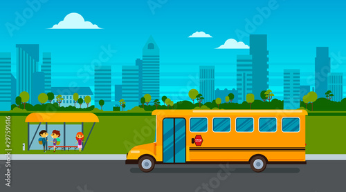 Kids are waiting for the school bus on the bus stop on city landscape background.