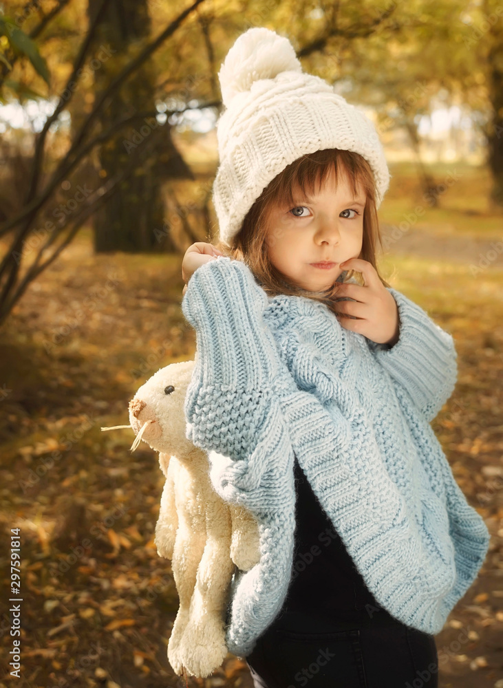 little girl with a toy rabbit little girl with a toy rabbit