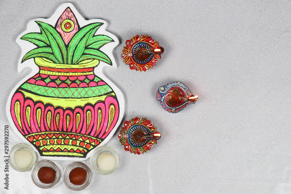 Deepawali Diwali Celebrations with Diya Sweets and Decorations Silver Background