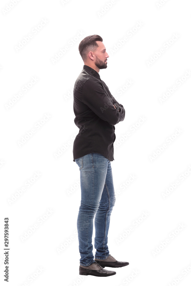 side view. modern young man in jeans side view. modern young man in jeans