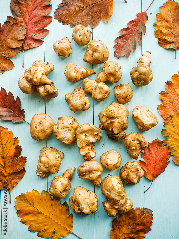 Fototapeta premium Jerusalem artichoke on wood