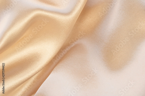 Shiny beige luxury silk background  photo