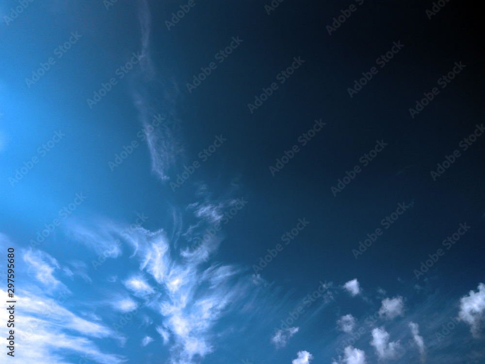 photo of blue sky with white clouds on a summer day