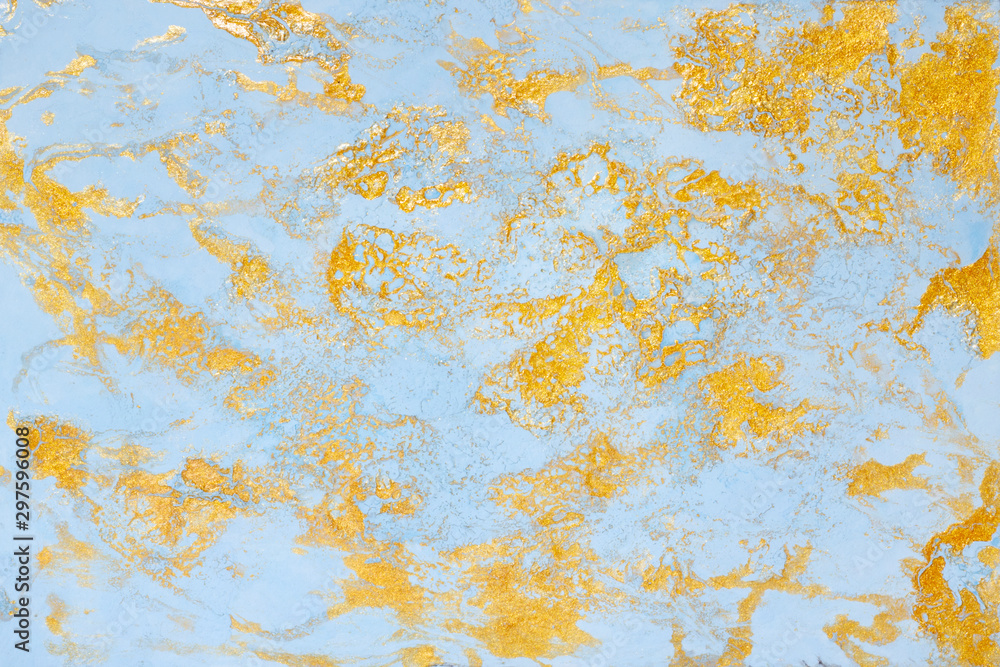 Abstract marble fluid art mix gold oil paint and light blue acrylic paint  on paper background Stock Photo
