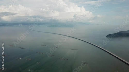 Aerial panning fish farm to Sultan Abdul Halim Muadzam Shah Bridge and Pulau Aman.