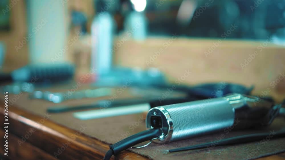 Hairdresser 's workplace with hairdresser tools on a wooden austin Hairdresser 's workplace with hairdresser tools on a wooden austin