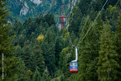 Mountain cable car, telecabin in the Bucegi Mountains. Mountain landscape in Bucegi Natural Park near Busteni, Romania.