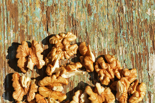 organic walnuts on wooden background