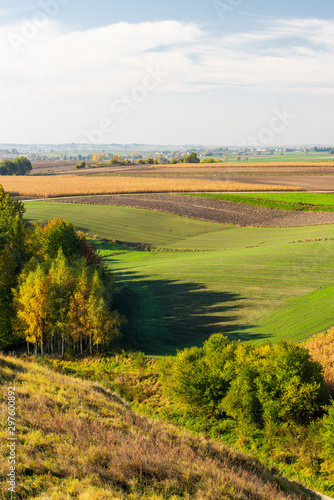 Rolling Hills in Polish Coutryside with Farm Fields at Fall Season © marcin jucha