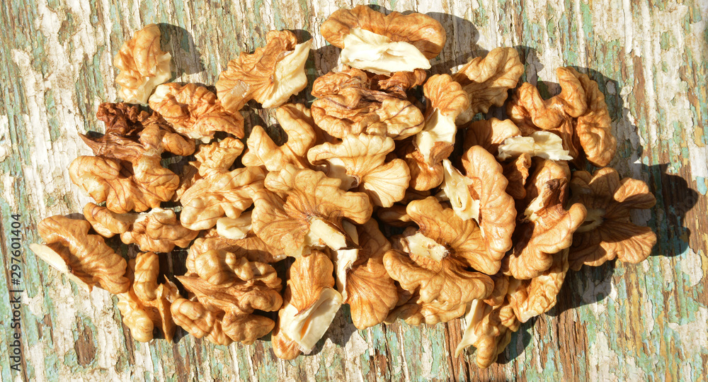 organic walnuts on wooden background organic walnuts on wooden background