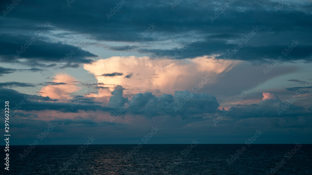 Dramatic cloudscape over water