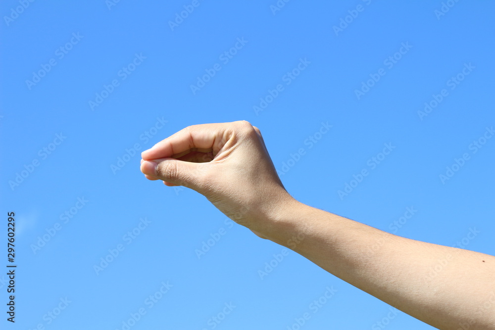 Woman hand isolated on clear sky background Woman hand isolated on clear sky background