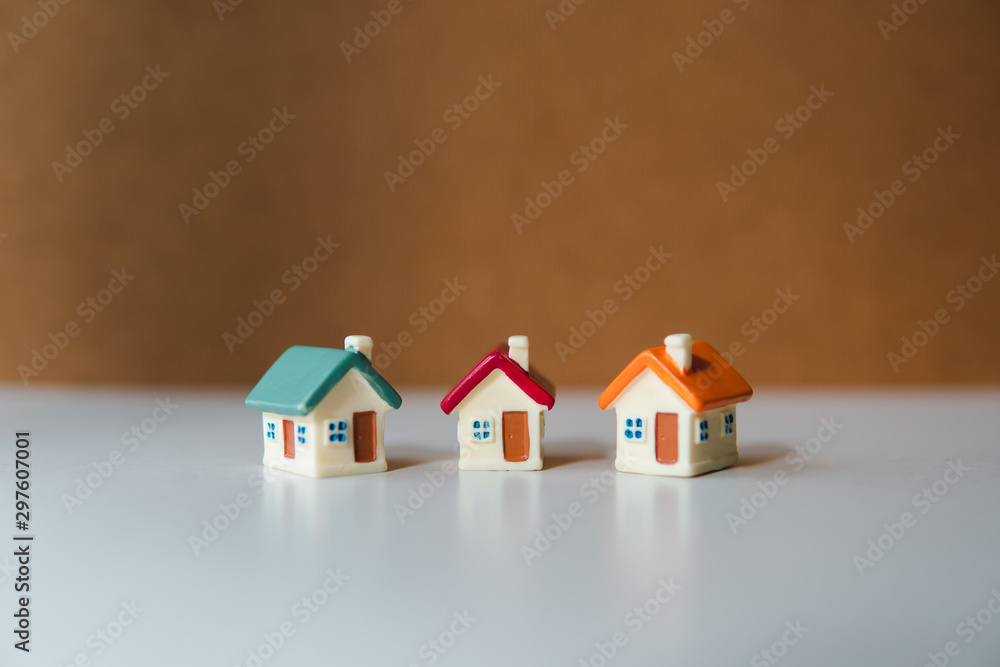 Colorful miniature house using as property and family concept