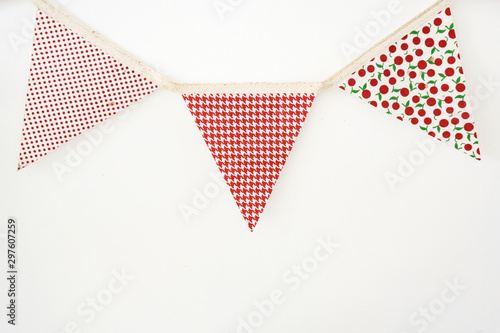 Vintage party triangle flags on white wall background, Isolated.